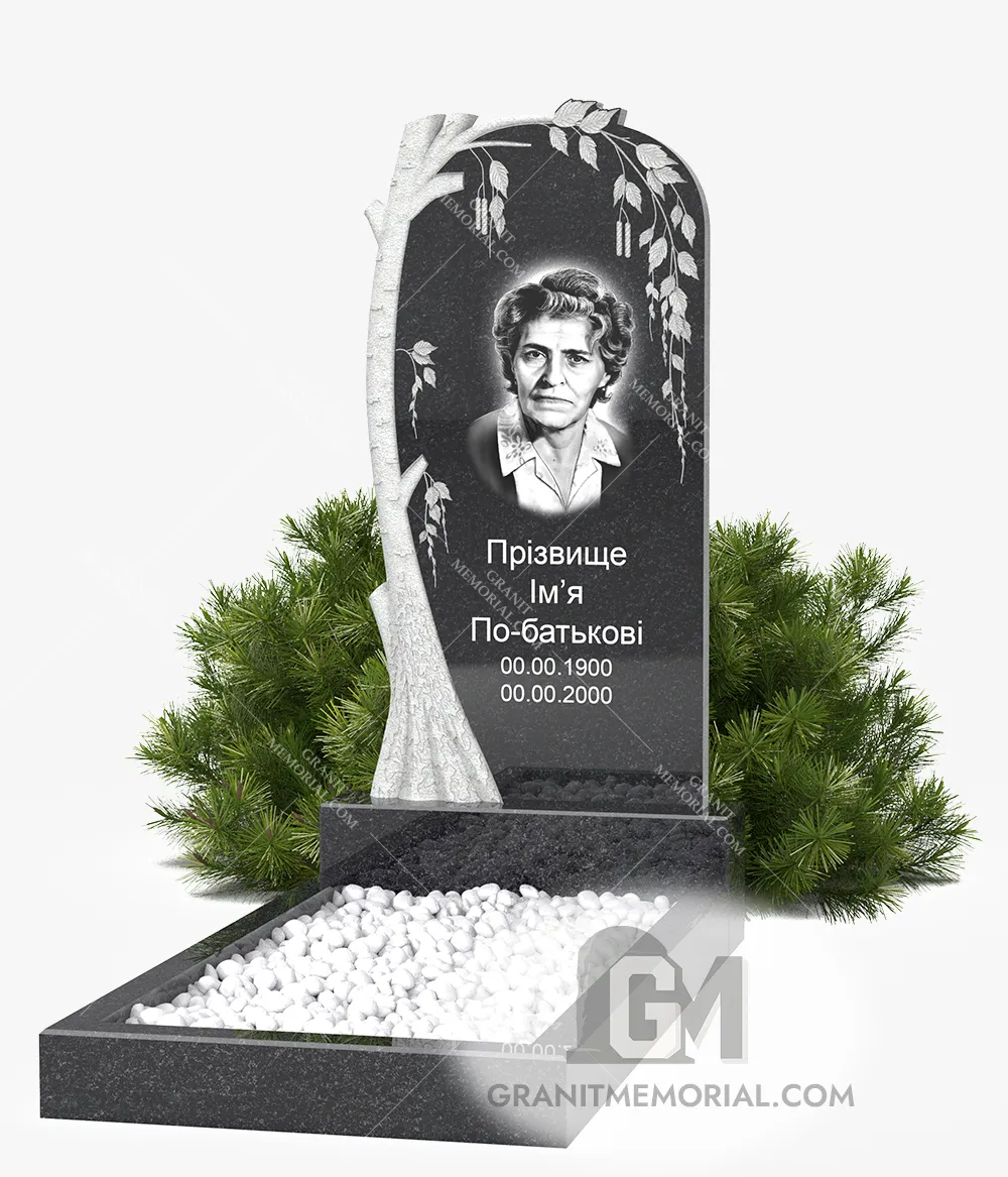 Гранитный памятник с белой березой