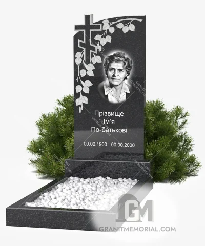 Памятник с резным крестом и ветвью