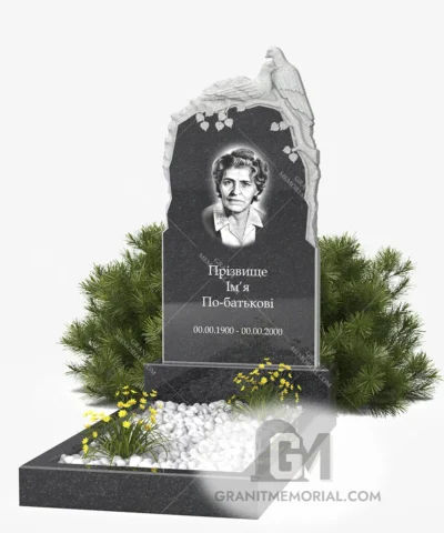 Гранитный памятник с парой голубей