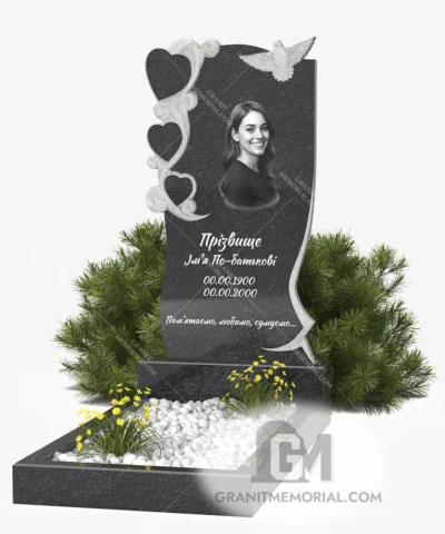 Памятник с ажурными сердцами и голубем