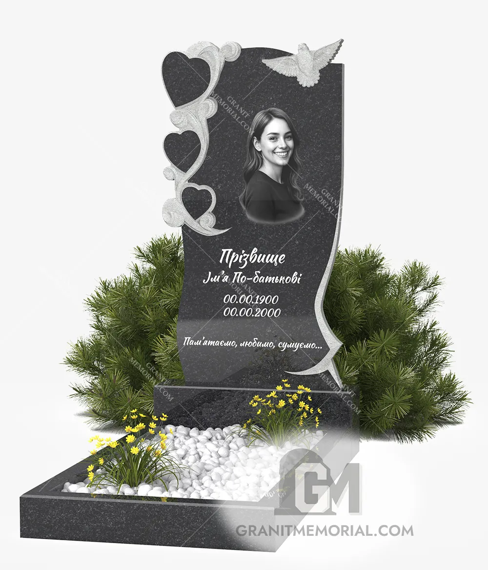 Памятник с ажурными сердцами и голубем